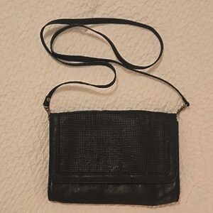 Black Crossbody Bag with Flap Closure and Textured Fabric